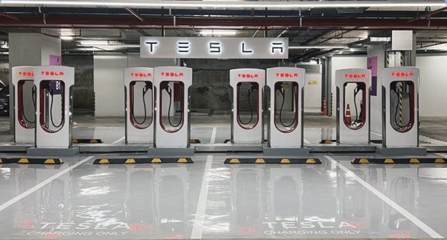 tesla supercharger marche th